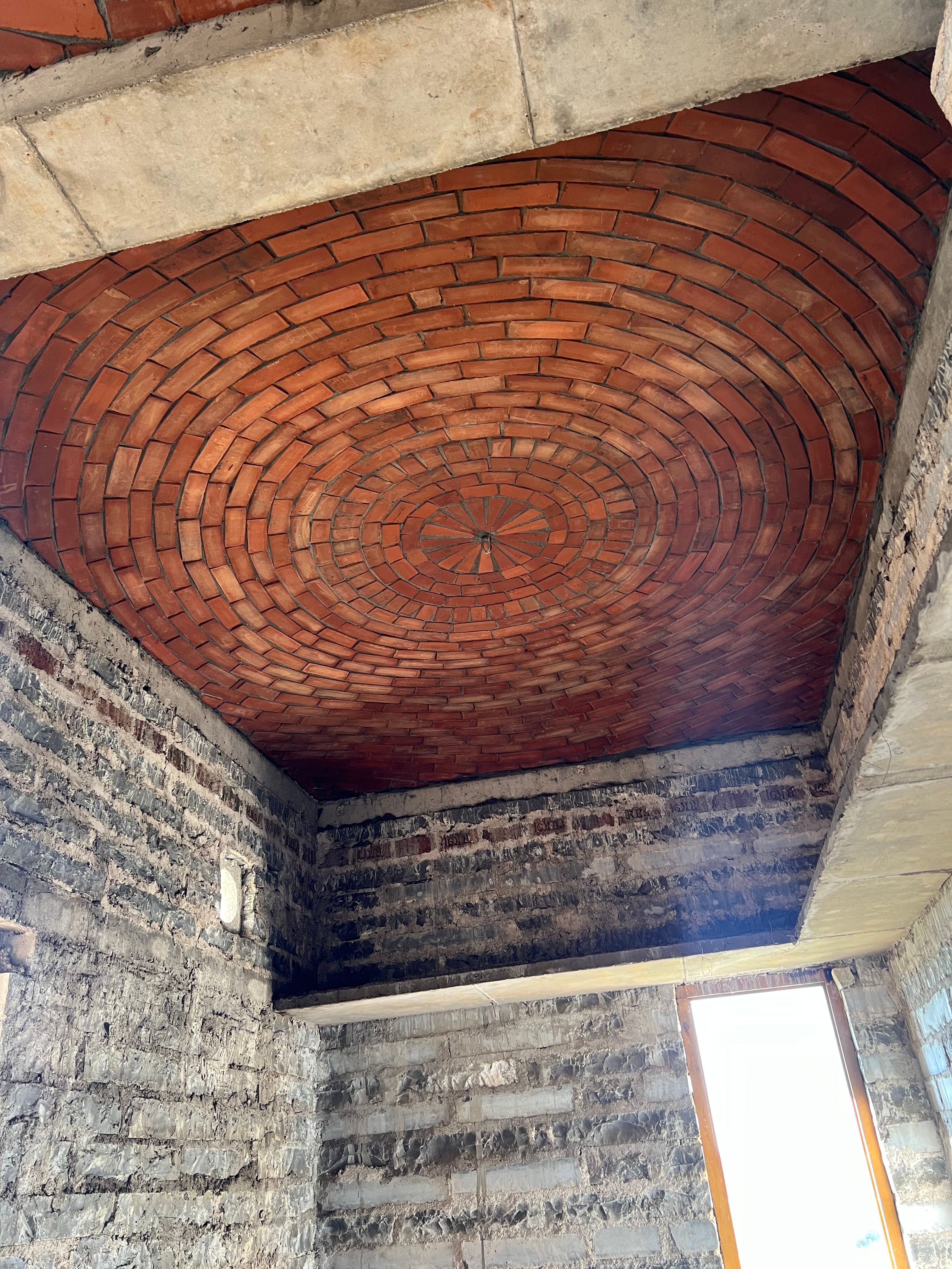 Completed circular dome with radial brick pattern - Rohtak Domes 2024