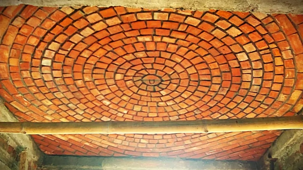Circular brick dome ceiling with spiral pattern by Rohtak Domes